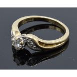 9ct gold gold ladies diamond swirl ring with approximately 0.25ct of diamonds. 3.1 grams. Size M.