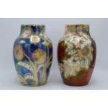 A pair of Royal Winton bulbous lustre vase both with floral designs on a blue and red background (2)
