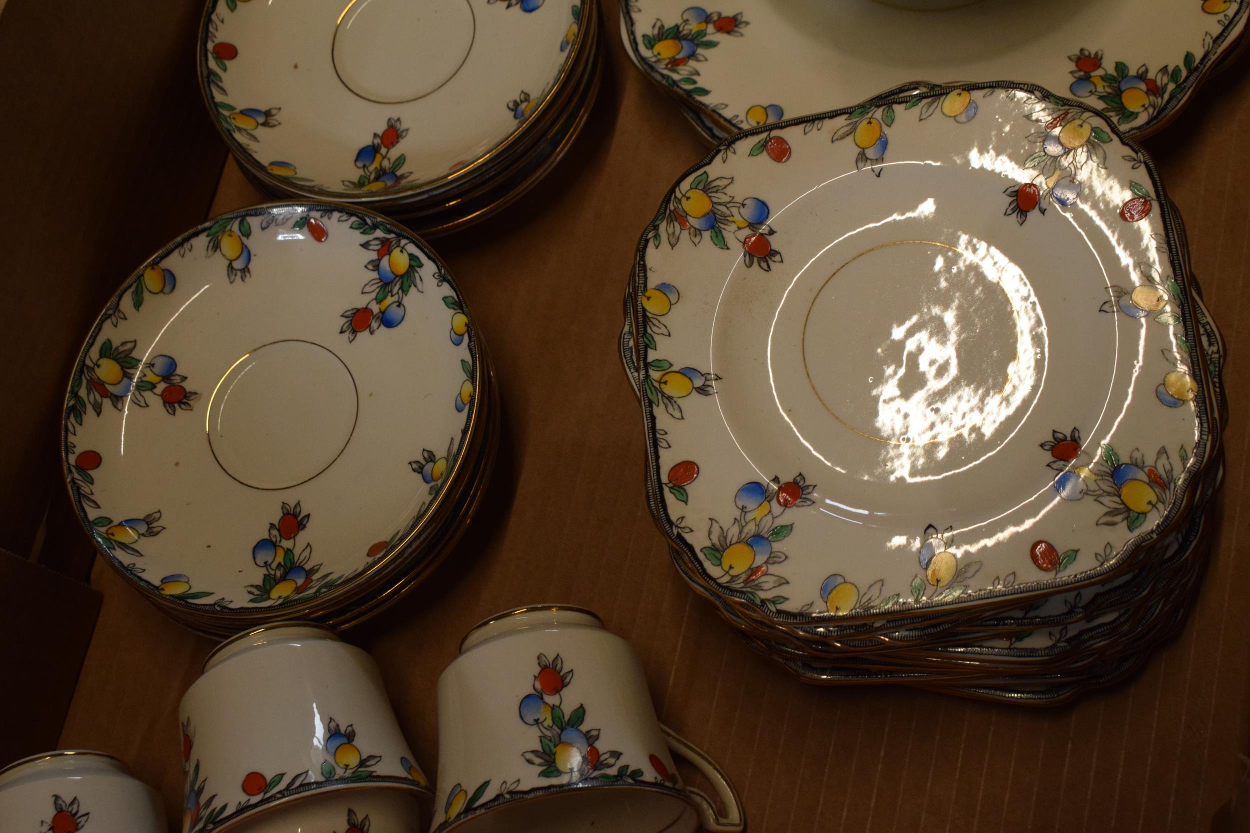 A Wetley China tea set decorated with fruits and foliage to include cups, saucers, side plates, milk - Image 3 of 4