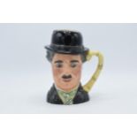 Large Royal Doulton character jug Charlie Chaplin D6949 with certificate. In good condition with