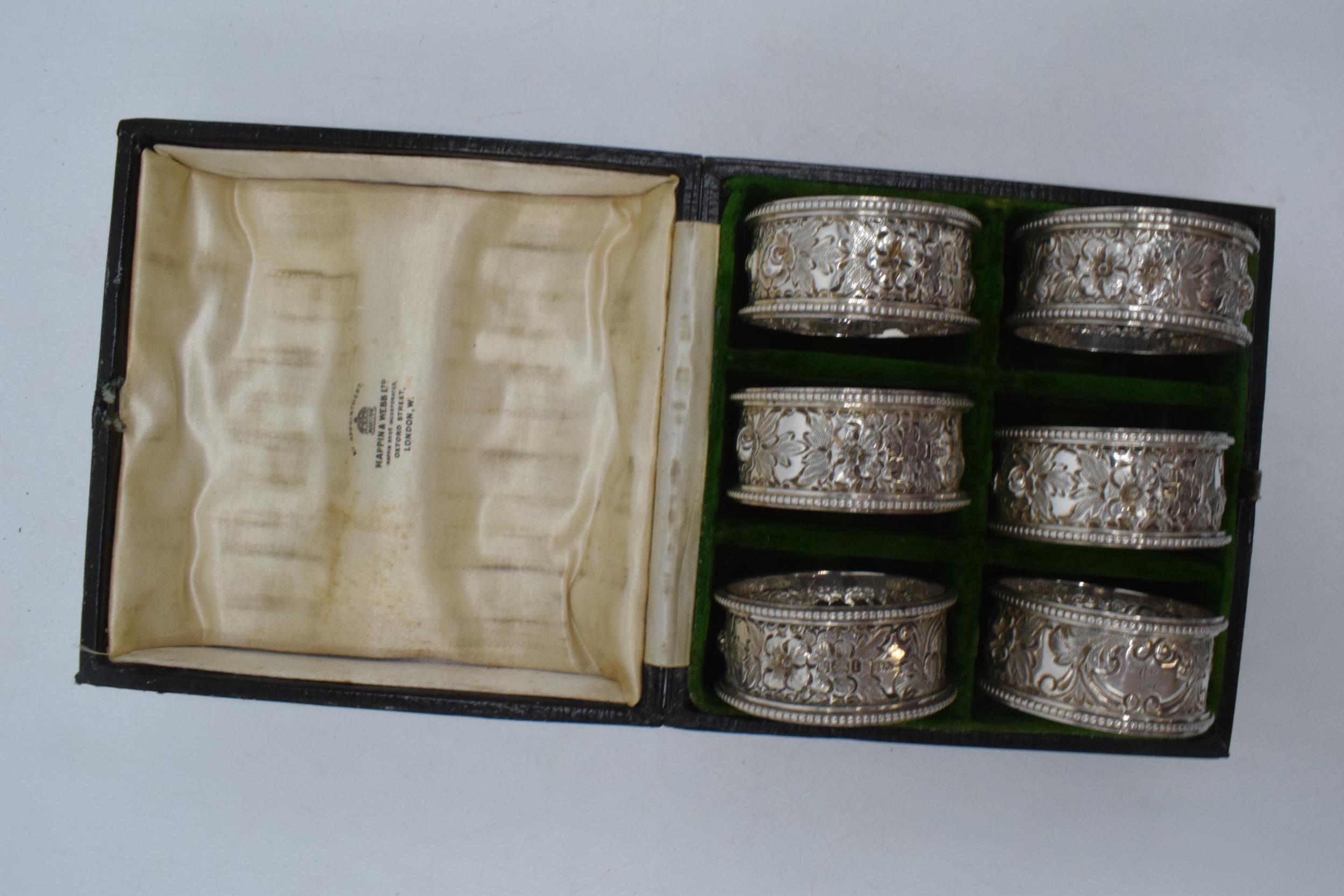 A cased set of 6 silver napkin rings, Sheffield 1903. 177.9 grams. - Image 3 of 3