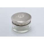 Silver lidded glass pot by Mappin and Webb, Birmingham 1940. 47mm wide. In good condition.