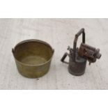 A large antique brass jam pan, 36cm diameter, and a large vintage blow torch, 44cm tall (2). Both