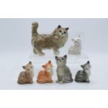 A collection of Beswick cats to include 1886 in grey, Persian cat 1898 in grey and 1436 in various