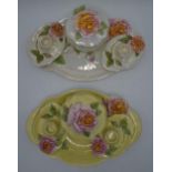 A pair of Royal Winton Grimwades dressing table sets in floral lustre designs to consist of a