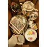 A mixed collection of items to include tall resin figures, tea and dinner ware, lidded urns, local