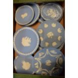 A collection of Wedgwood light blue Jasperware plates to include London, Christmas plates etc (11