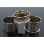 A trio of silver napkin rings to include Birmingham 1897, 1917 and Chester 1905 (3). 52.3 grams.