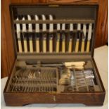 A vintage boxed Mappin and Webb oak cased cutlery canteen (all complete and as new) with
