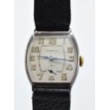 A vintage Tiffany and Co sterling silver wristwatch on black leather Condor strap, in ticking