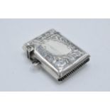 Silver vesta case with floral decoration and vacant cartouche. Birmingham 1945. 14.9 grams.