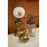 A mixed collection of items to include a vintage hand-propelled butter churn, brass oil lamp and
