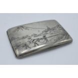 A white metal cigarette case with Eastern scenes stamped 'Sterling' to inside. 138.3 grams.