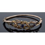 9ct rose gold ladies bangle set with seed pearls and sapphires (or similar). 6.7 grams. 68mm wide.