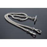 Silver double Albert chain with T-bar, each link being marked. 43.7 grams. 44cm long.