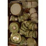 A collection of tea ware to include Gladstone green gilt trios and other items together with Bohemia