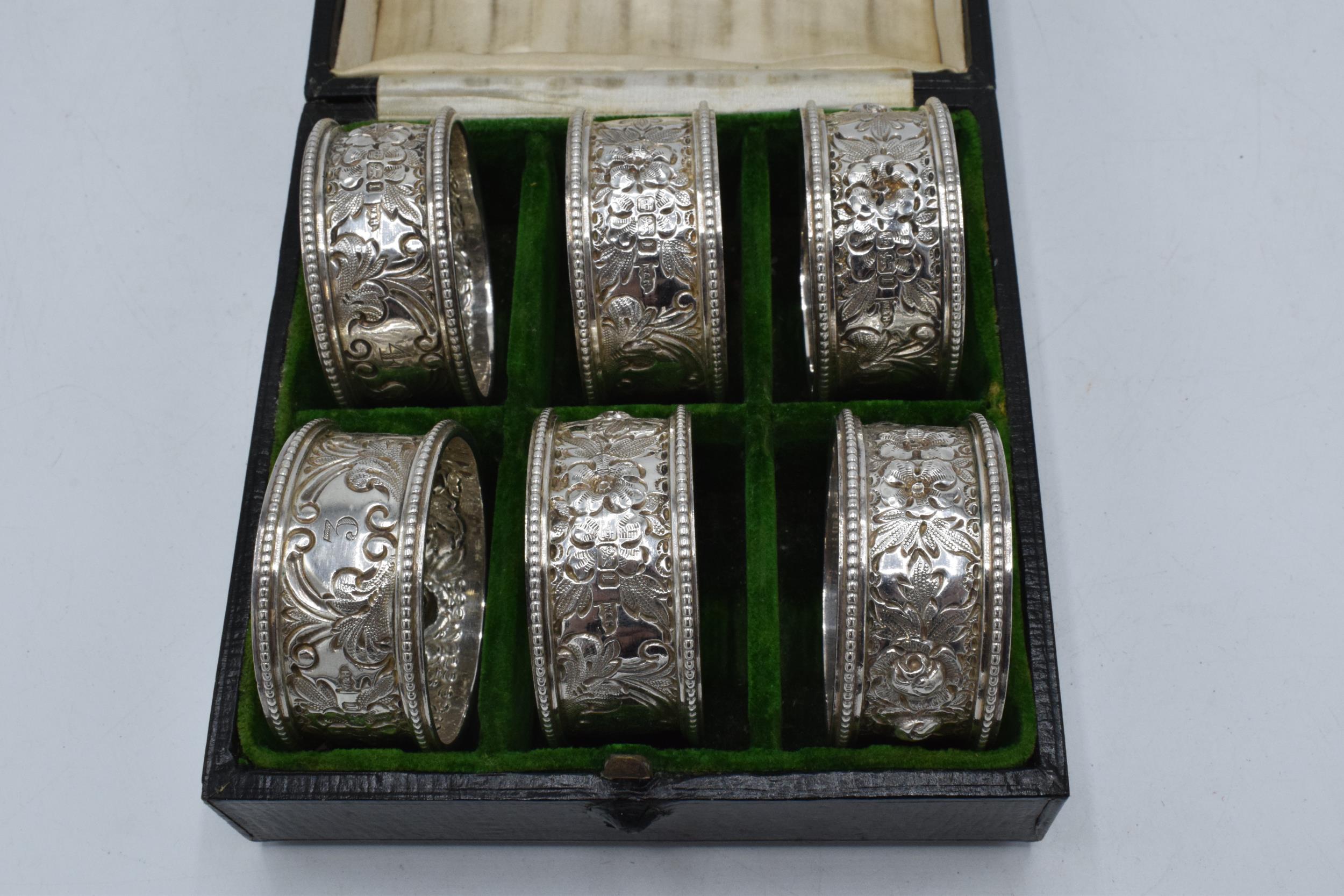 A cased set of 6 silver napkin rings, Sheffield 1903. 177.9 grams.