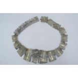 A silver EPNS ladies ornate belt. 74cm long. Same of the plating has worn off.