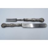 A silver-handled knife and fork set, Prague, circa 1850 (2). 24cm long.