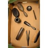 A collection of ebonised wooden items to include brushes, pots and trinkets etc (Qty).