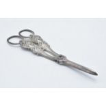A pair of silver grape scissors, Sheffield 1844, Aaron Hadfield, 105.1 grams. 17.5cm long.