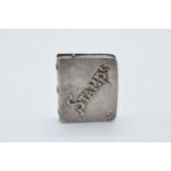 Sterling silver stamp case, 13.4 grams. 36mm tall.