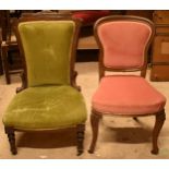 A pair of late 19th century / early 20th century upholstered chairs to include a nursing example and