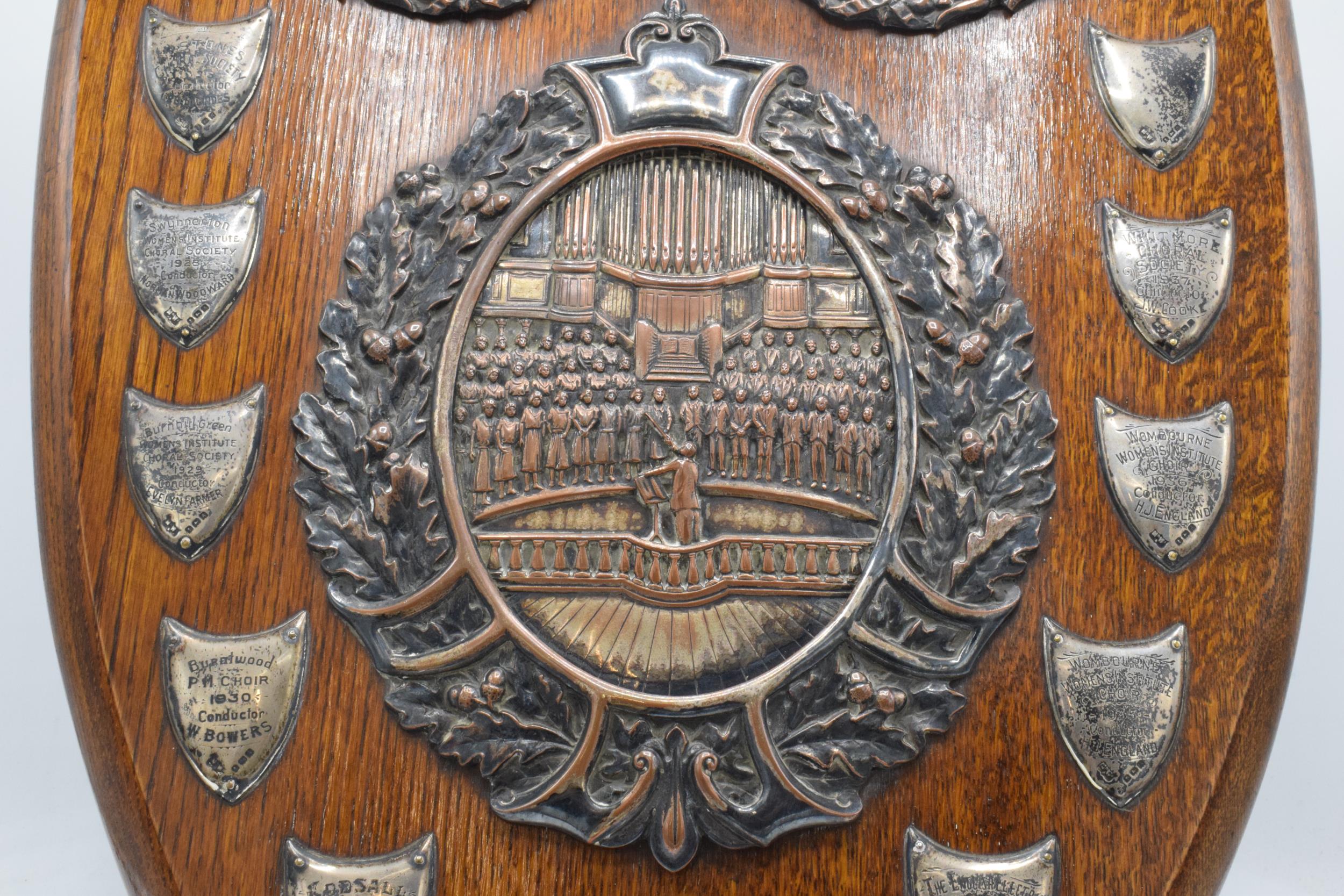 A wooden presentation shield with hallmarked silver name shields and a silver plate central relief - Image 10 of 12