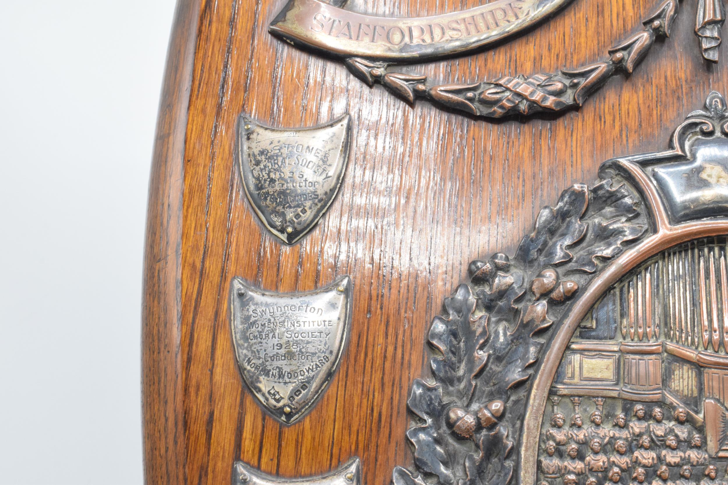 A wooden presentation shield with hallmarked silver name shields and a silver plate central relief - Image 6 of 12