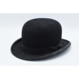 A black felt bowler hat by the Atlas brand