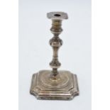 Edwardian silver candlestick, Birmingham 1903, with loaded base. 11.5cm tall.