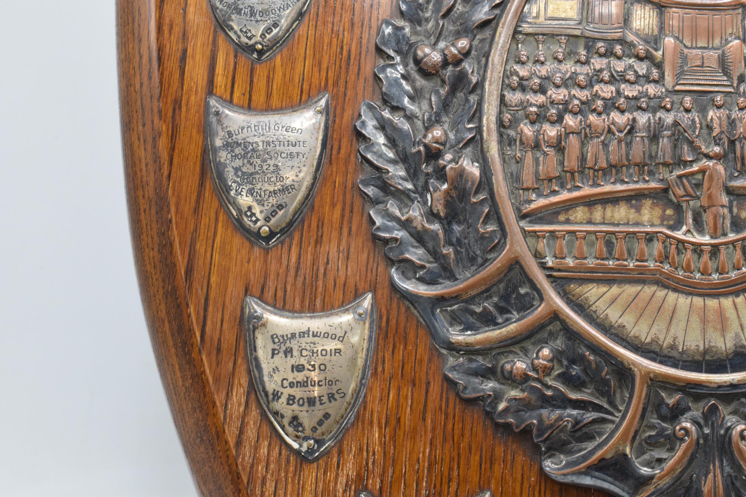 A wooden presentation shield with hallmarked silver name shields and a silver plate central relief - Image 5 of 12
