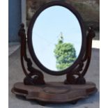 A Victorian 19th century mahogany dressing table swing mirror with central compartment, 65cm tall.