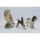 A trio of Beswick animals to include barn owl 1046, large brown outstretched foal and cocker spaniel