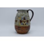 Large Royal Doulton stoneware jug decorated with tulips '1482' and 'GS' impressed to base, 22cm