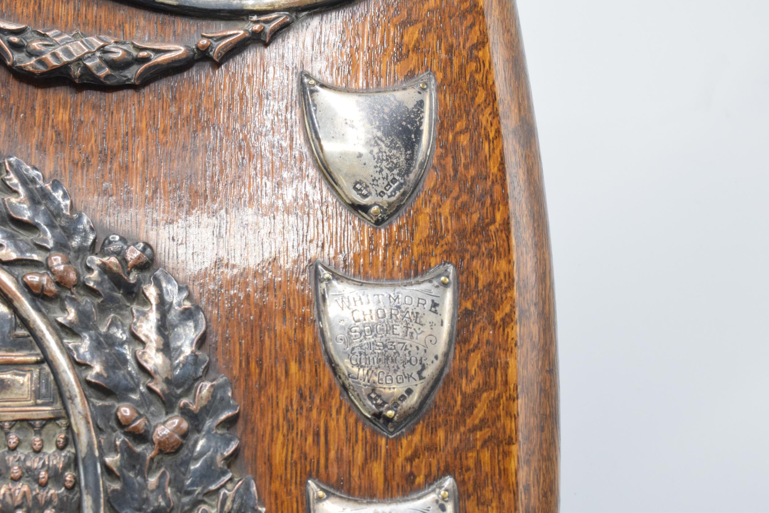 A wooden presentation shield with hallmarked silver name shields and a silver plate central relief - Image 7 of 12