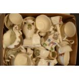 A large collection of mainly crested china from across the country to include vases, jugs, bowls,