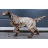 A vintage cast metal retriever dog figure, 35cm long.