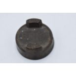 A vintage metal oil can cap 'BR(S)' to top. 4.5cm wide.