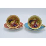 A pair of Aynsley Orchard Gold cups and saucers with coloured backgrounds, both signed D. Jones (4).