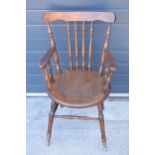 A late 19th century pine (or similar) wooden carver armchair, 93cm tall. In fair condition showing