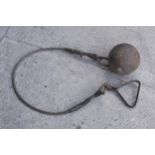 A vintage metal ball and chain for the hammer throw, presumed to be Scottish, 114cm long.