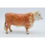 Early Beswick Hereford Bull 949 model with round backstamp (af). The piece from a distance