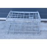 A vintage 20th century galvanised bottle crate 'Wimpey' for 20 bottles, 46cm wide.