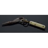 A pair of antique miniature scissors in the form of a stork and a miniature penknife, largest 4cm