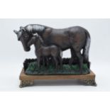 Reproduction cast metal boot brush in the form of a horse and foal, 29cm wide.