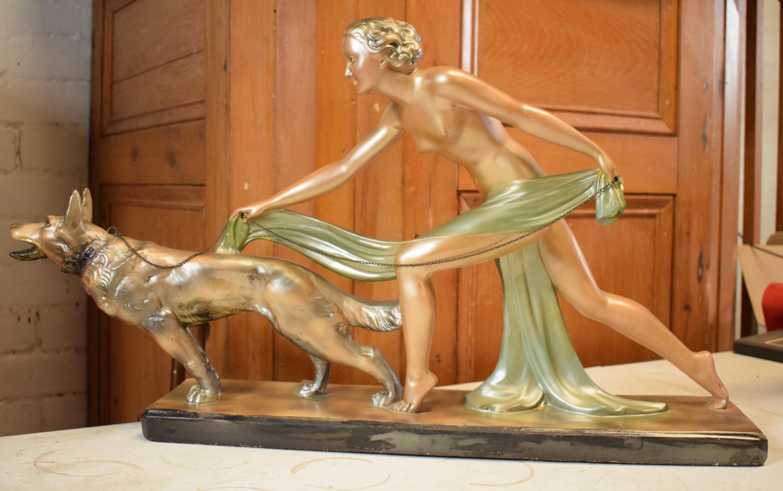 Art Deco 1930s plaster figure of a girl walking a dog, Reg Number 8330, 74cm long. 2 repairs to