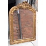 A large vintage gilt-style hanging over mantle mirror, 118cm tall. In good functional condition with