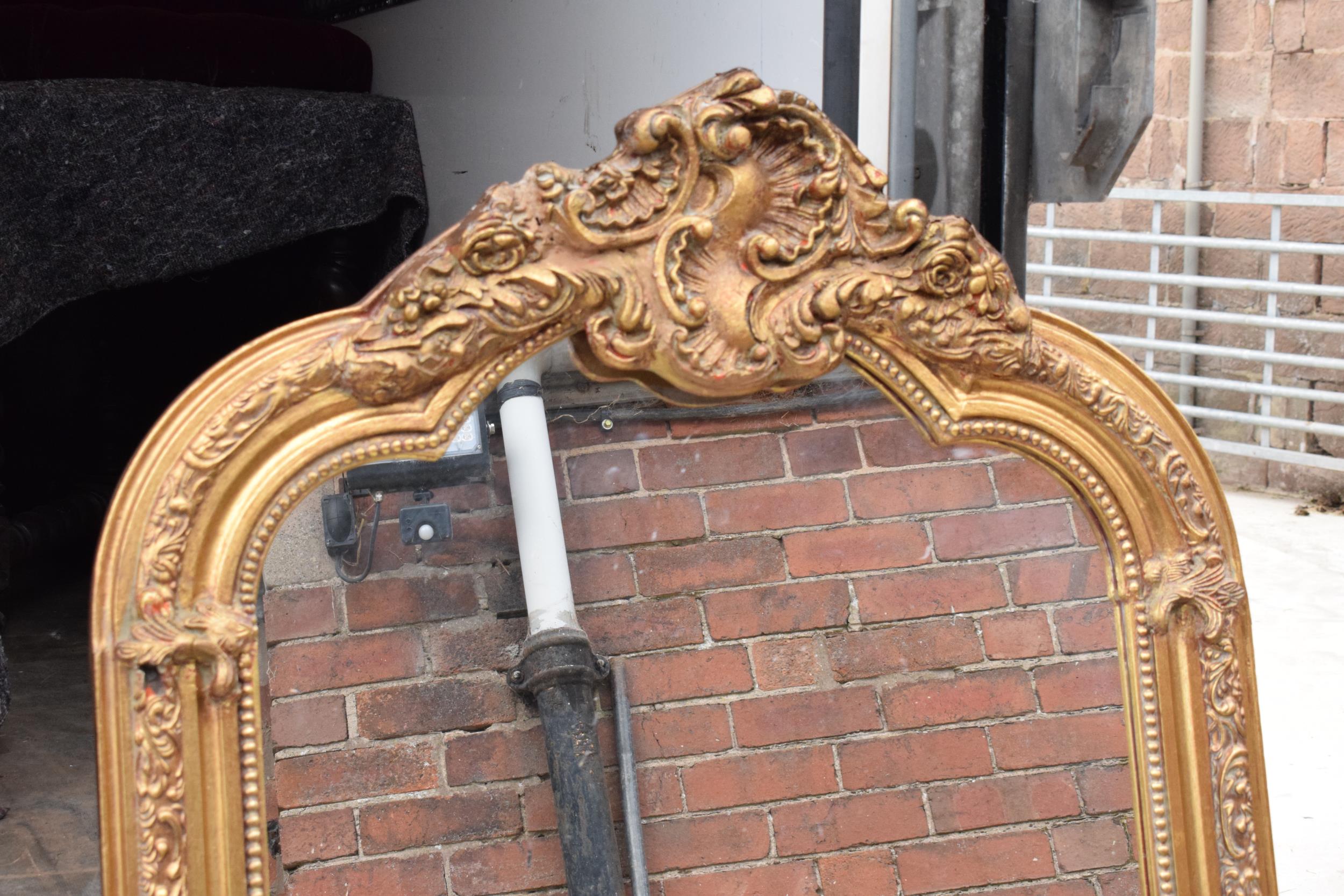 A large vintage gilt-style hanging over mantle mirror, 118cm tall. In good functional condition with - Image 2 of 7