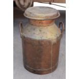 An early 20th century copper milk churn 'Daw's Creameries' complete with lid, 52cm tall. Generally